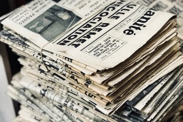 bundle of newspaper on table